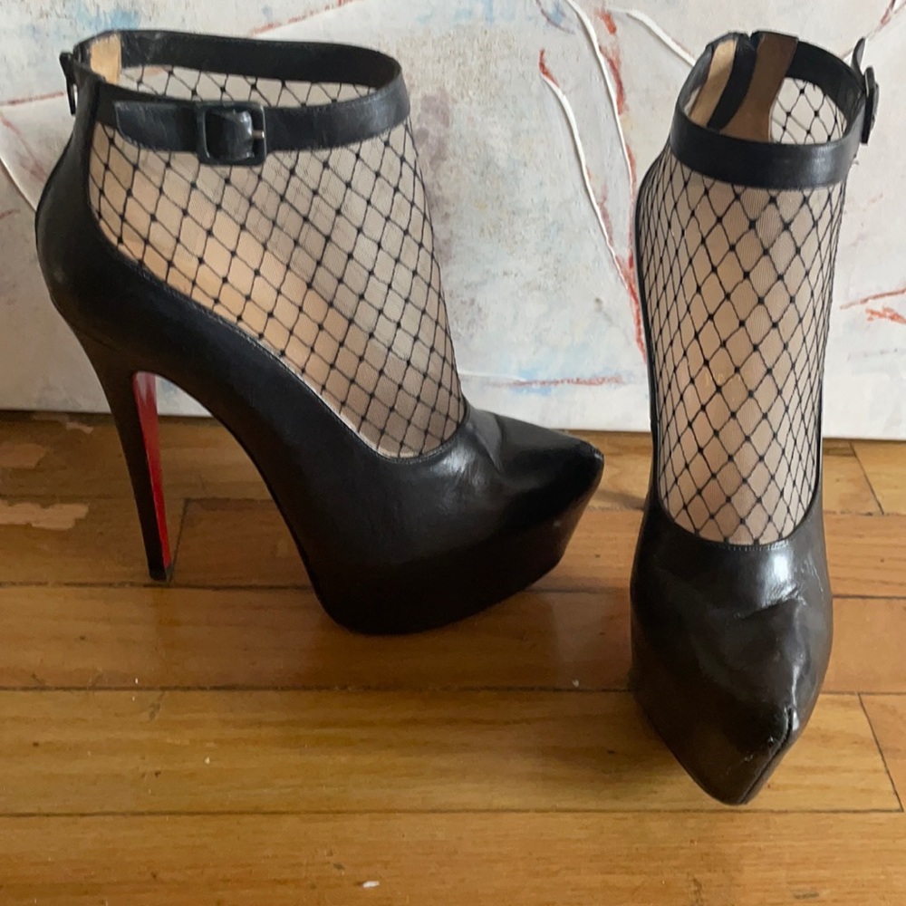 Christian Louboutin never worn